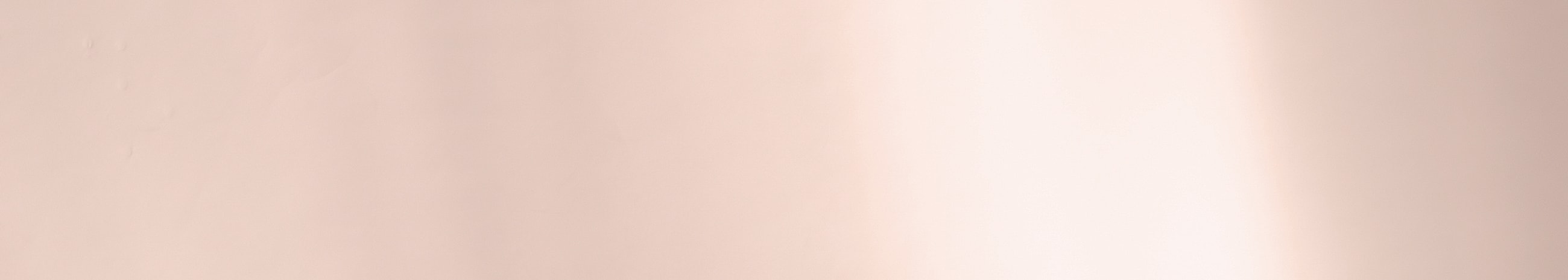 Soft pink gradient background texture.