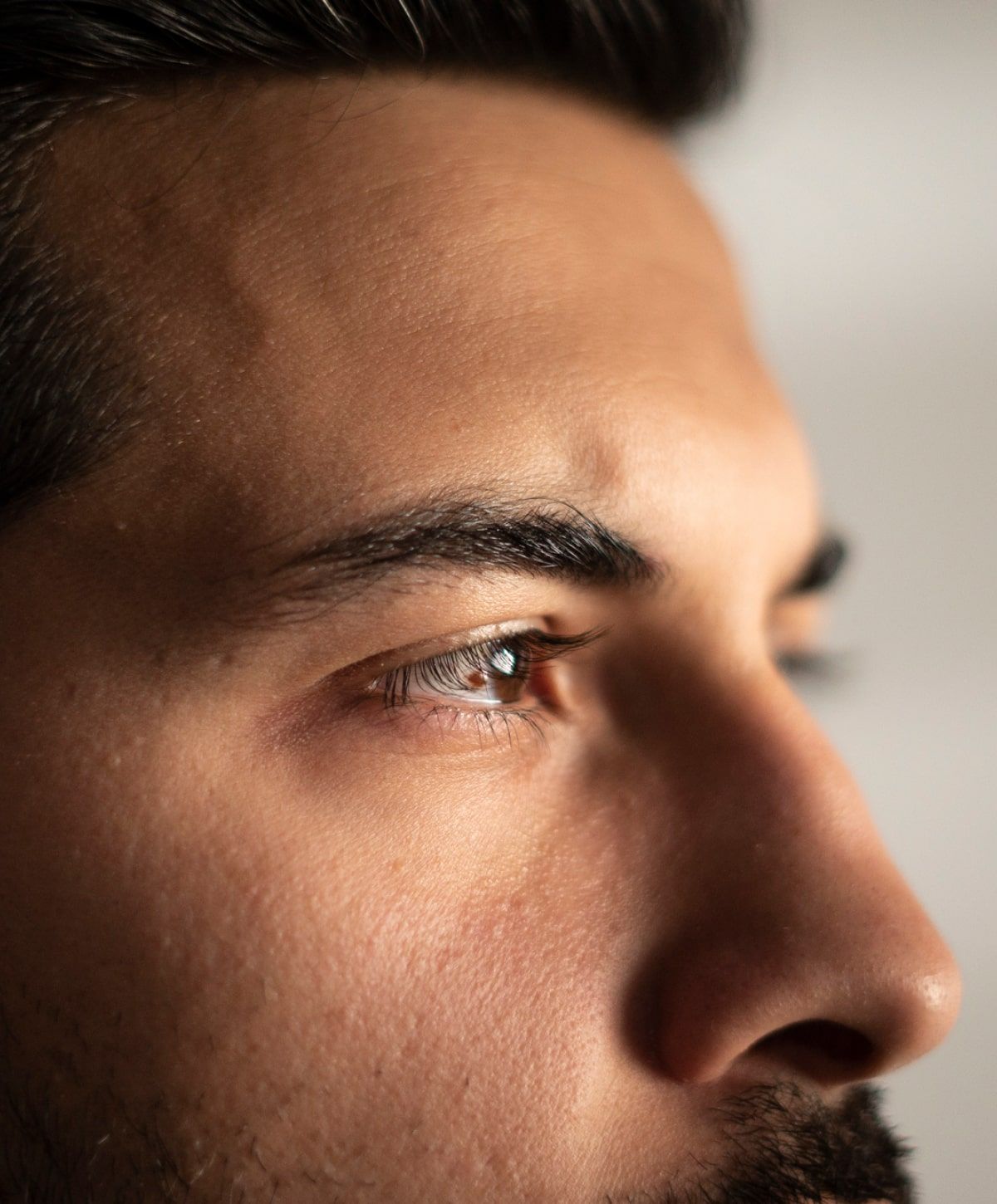 charlotte blepharoplasty for men model with black hair