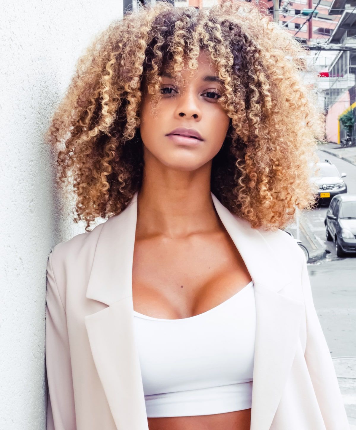 charlotte breast implant removal model with curly hair