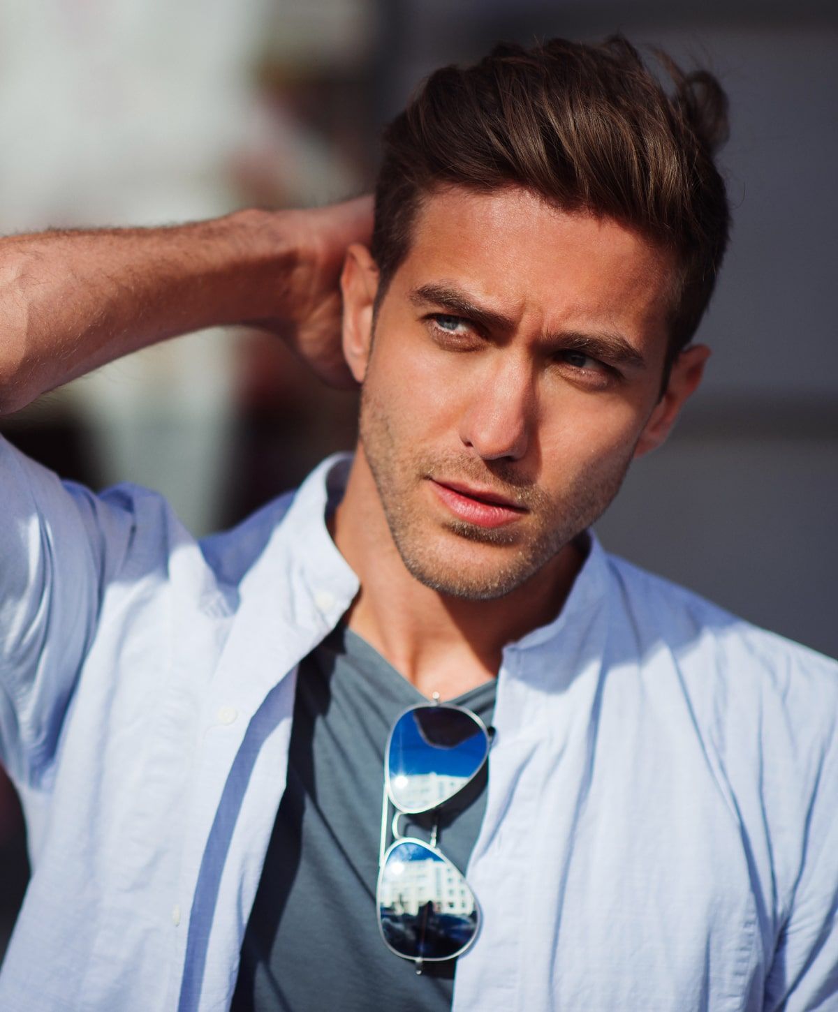 charlotte mens laser services model with hand on head