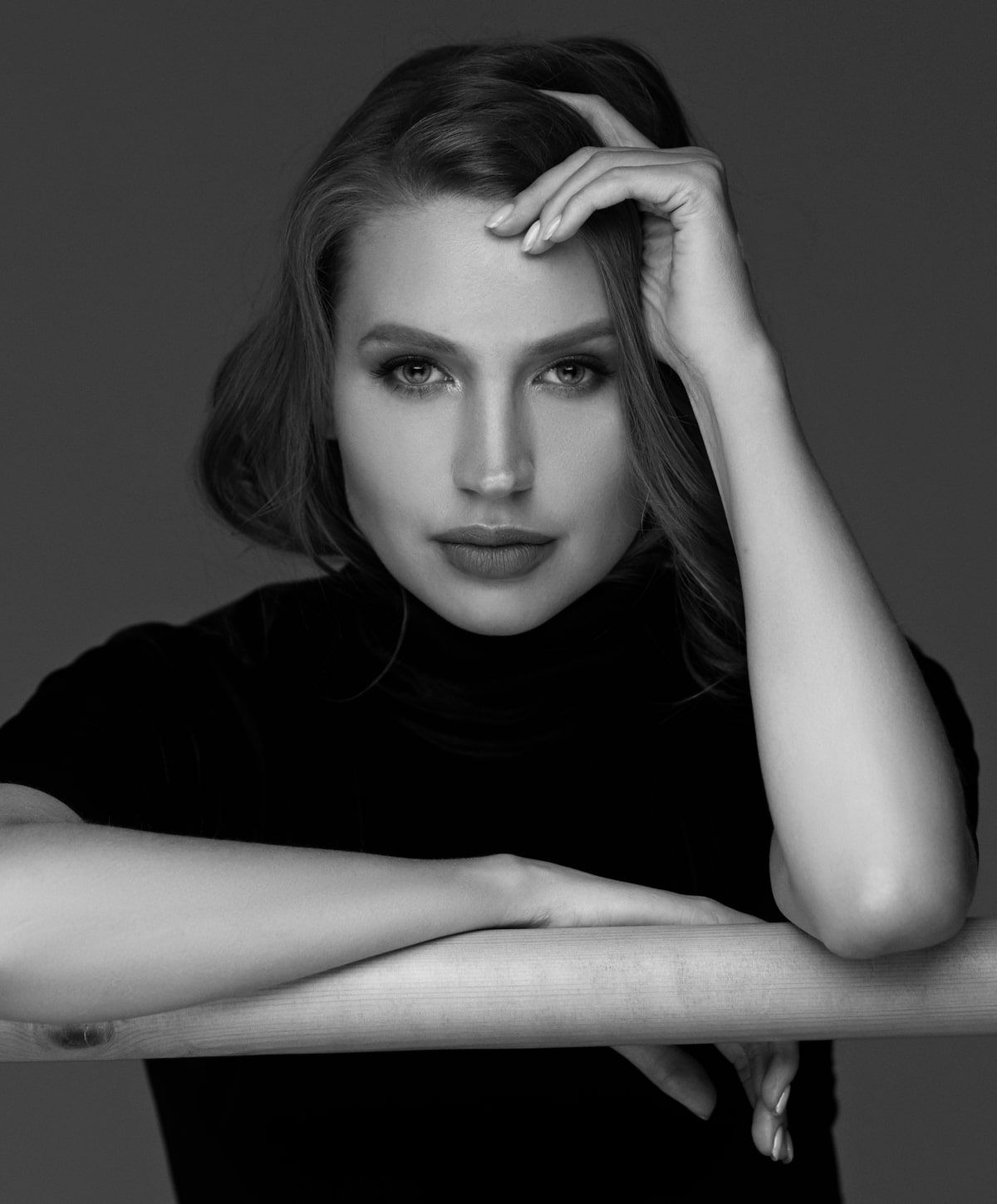 charlotte botox model with hand on head