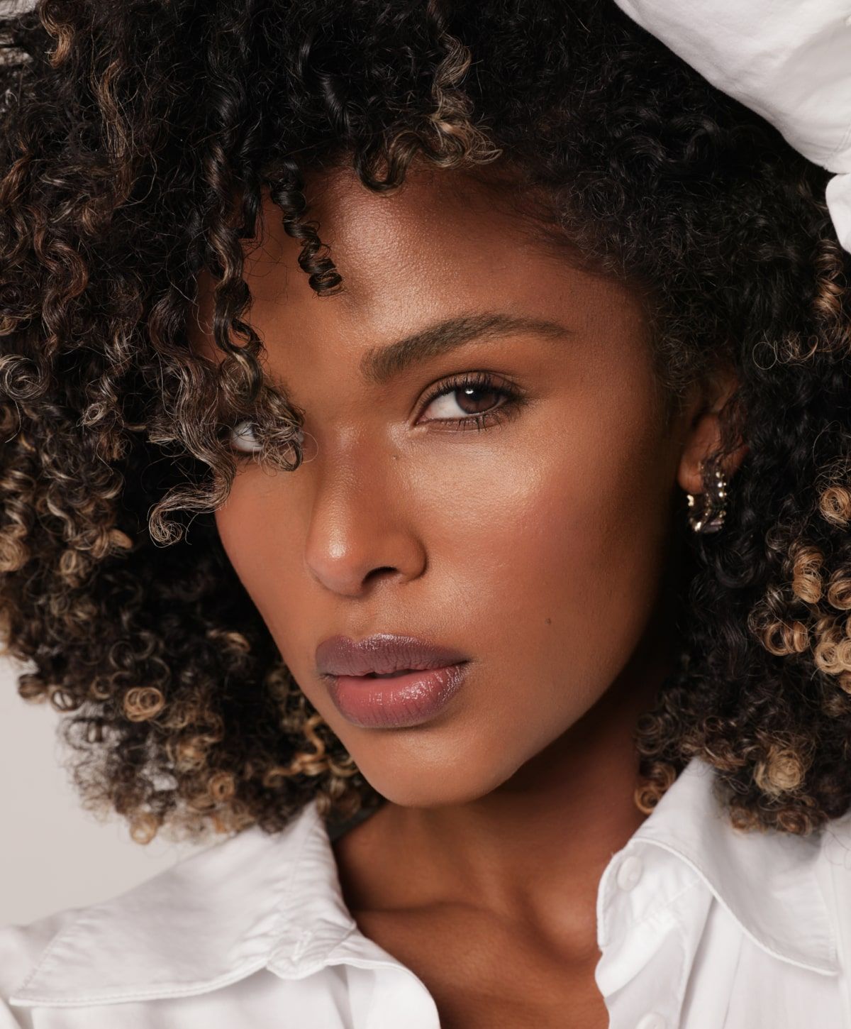 charlotte microneedling with prp model with curly hair