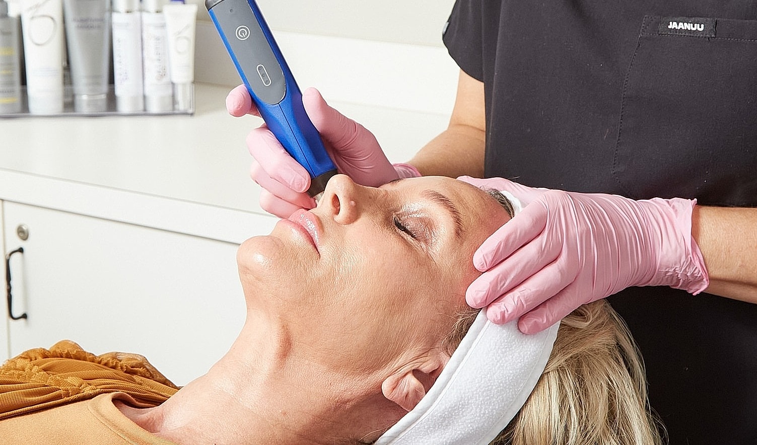 Facial treatment in progress at a spa.