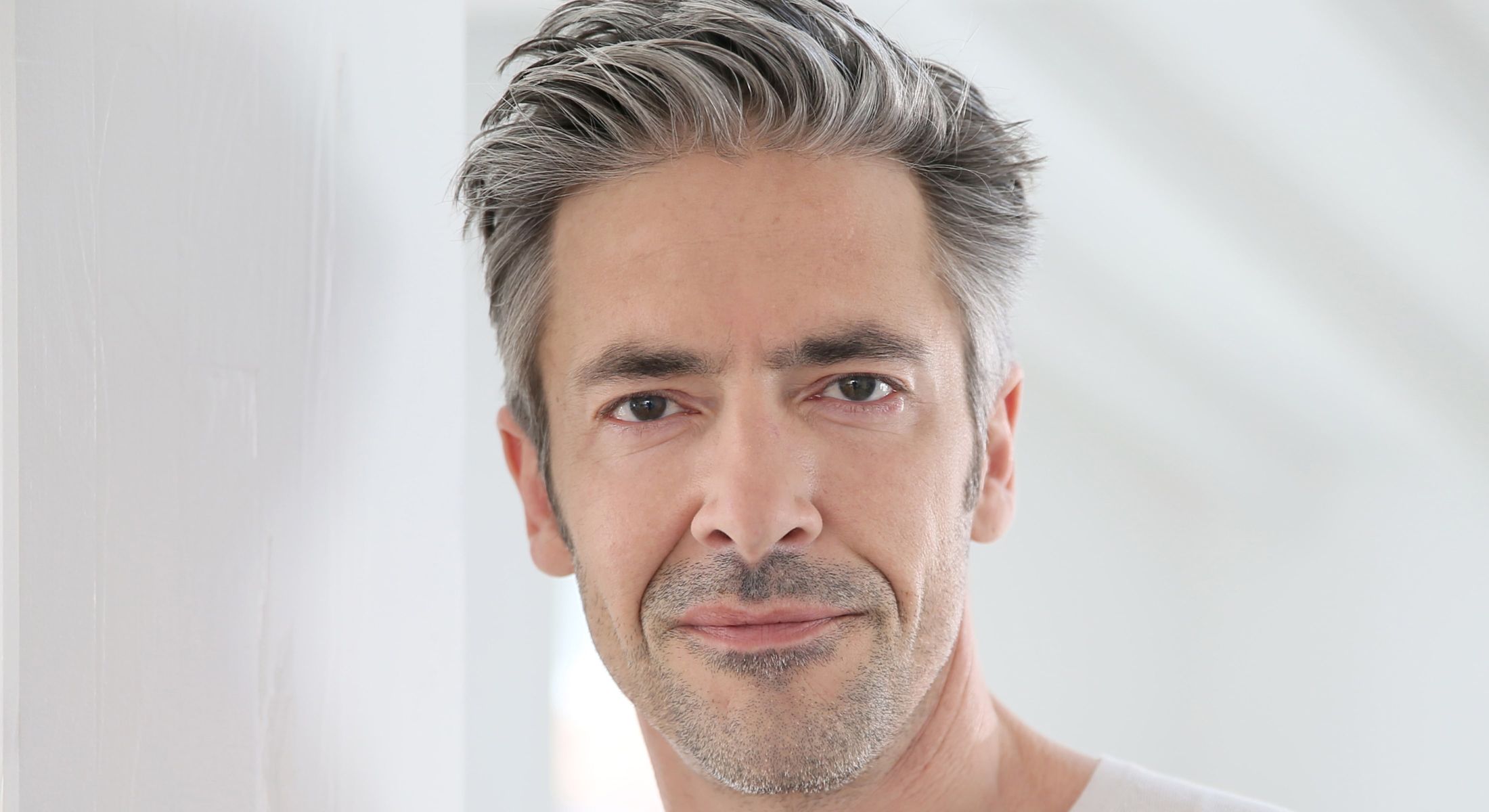 charlotte blepharoplasty for men model with white hair
