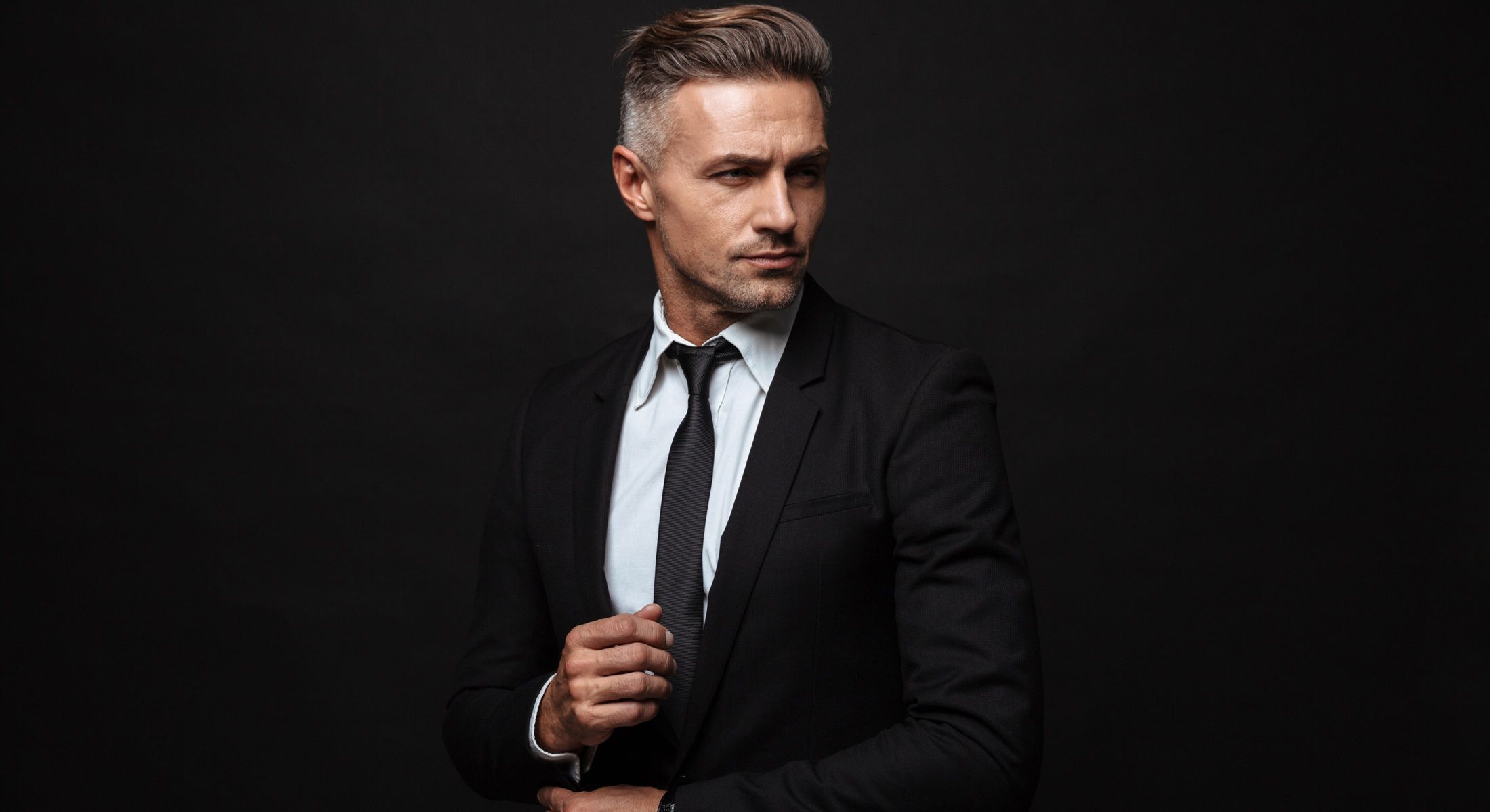 charlotte plastic surgery for men model with slicked back hair