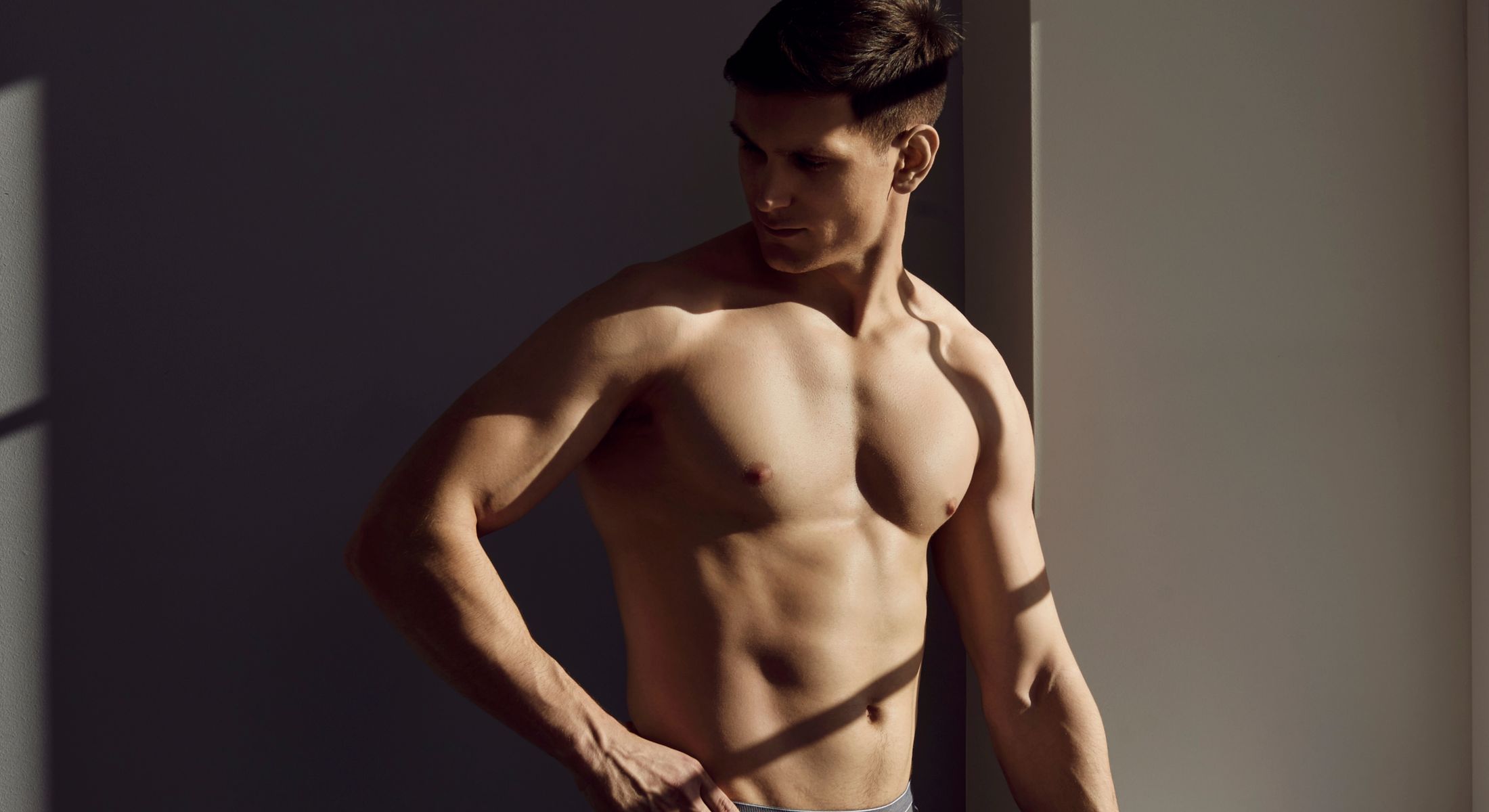charlotte gynecomastia model with dark hair