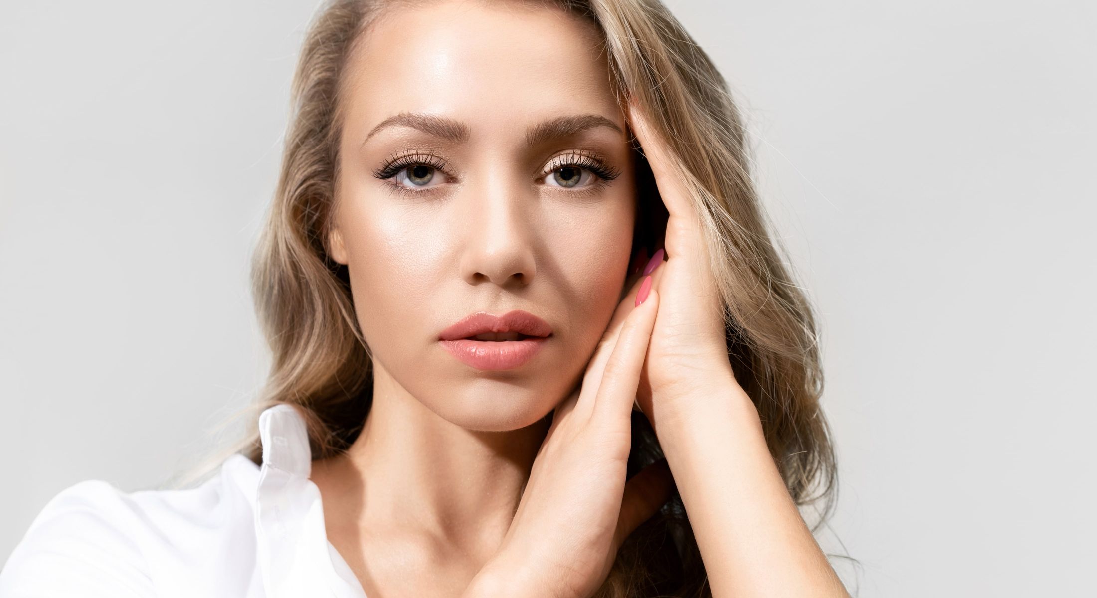 Close-up of a woman with blonde hair.